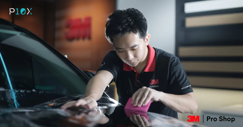 Why choose 3M Pro Shop Malaysia showing certified technician performing professional automotive protection installation in authorized facility