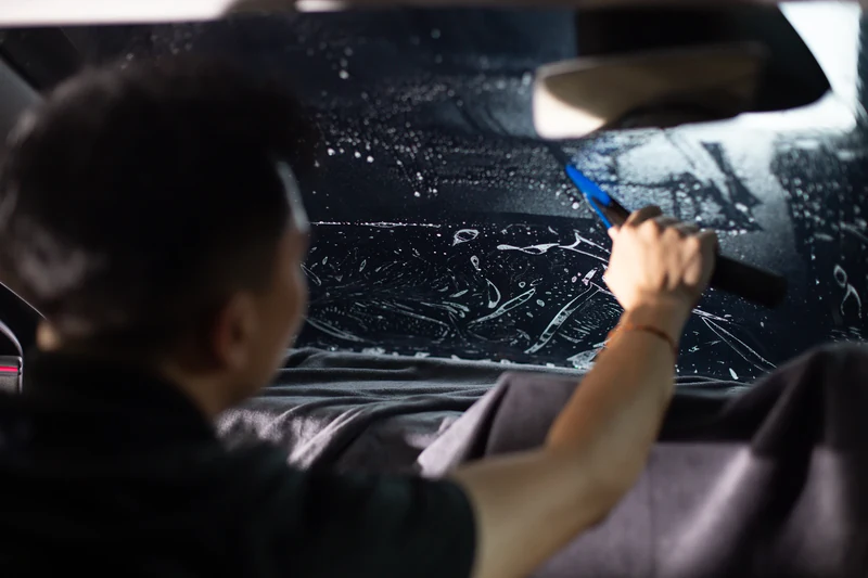 Installation of window tint by 3M certified installer.
