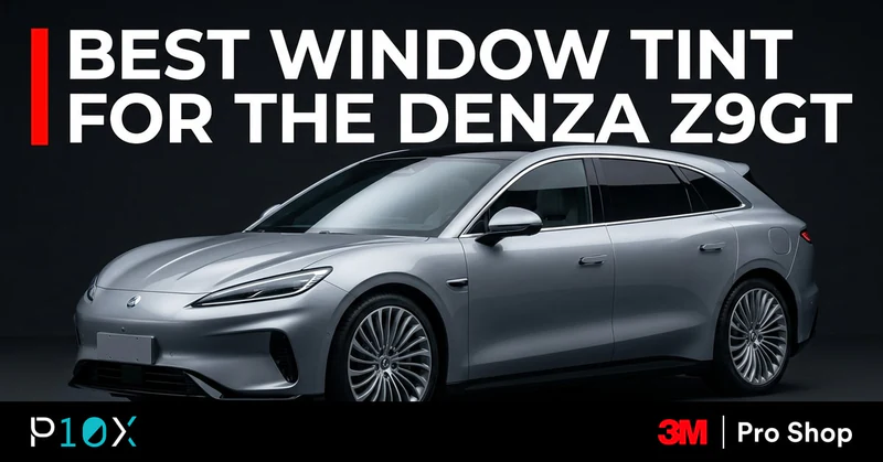 Silver Denza Z9GT grand tourer in a dark studio showing clean 3M Crystalline window tint.