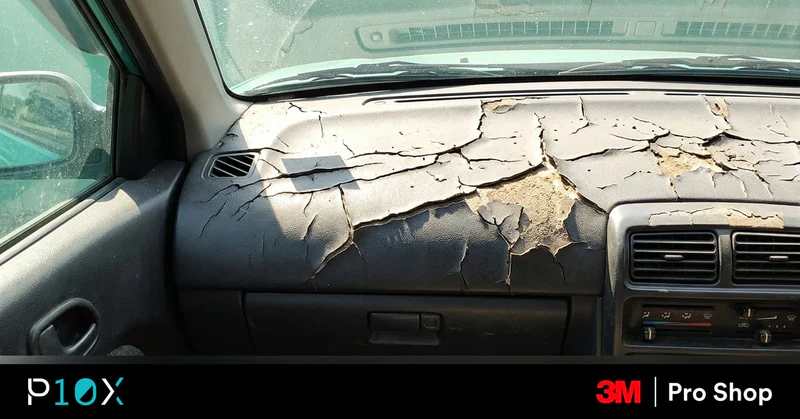 Dashboard cracking Malaysia UV protection showing sun rays hitting a cracked car dashboard through the side window